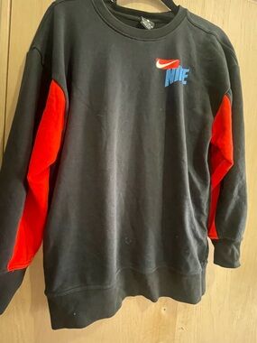 Nike Black Crewneck Sweatshirt with Red Sleeve Panels and Blue Logo